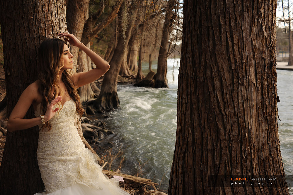 Guadalupe River day after shoot in Gruene TX Gruene TX trash the dress during sunset and bride posing