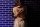 detail of two hands holding a girls back during an engagement session in austin texas