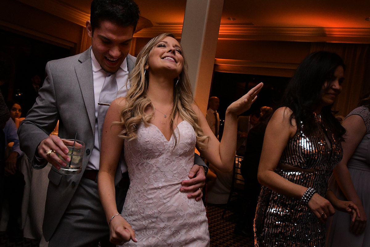 bride and groom make a sexy dance in the reception party of their wedding at zaza hotel in houston texas